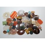 Unmounted polished agates etc.