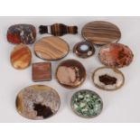 Agate and other stone set brooches.