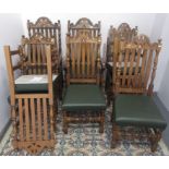 A set of eight Jacobean style oak dining chairs, including two carvers,