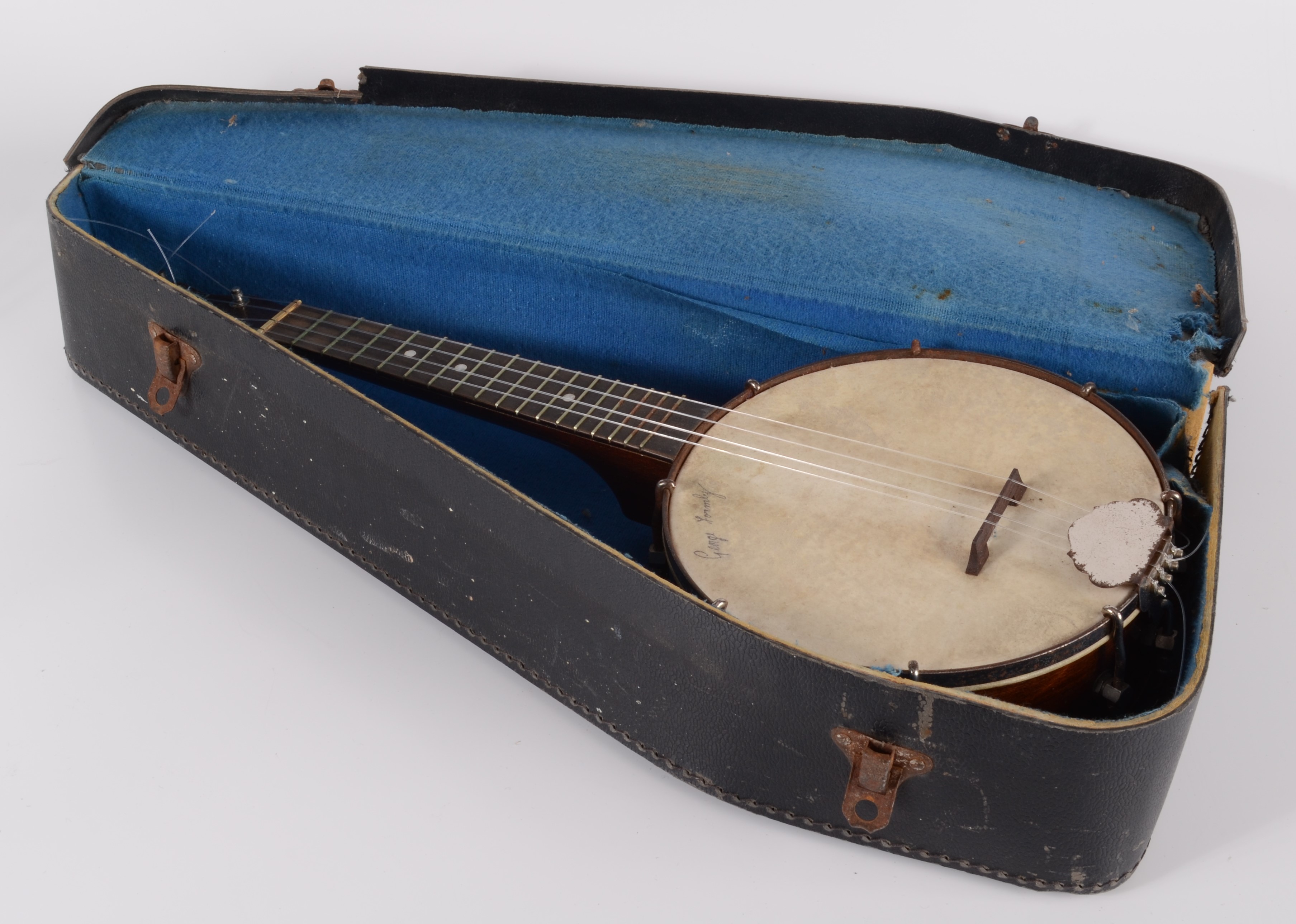 A George Formby ukulele, the skin drum with signature, length 55.5cm.