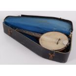 A George Formby ukulele, the skin drum with signature, length 55.5cm.