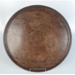 A George III mahogany circular tray, diameter 43.8cm.