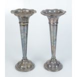 A pair of silver plated trumpet vases, impressed Rd No.