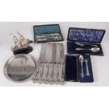 A silver modelled dhow, together with an American silver tray,