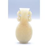 A Chinese celadon jade two handled pear shaped bottle vase, early 19th century,