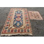 A Turkish rug, with four rows of three octagonal guls each enclosing stepped guls,