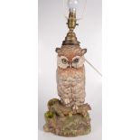 A German porcelain lamp base in the form of an owl, with blue crossed swords mark to base,