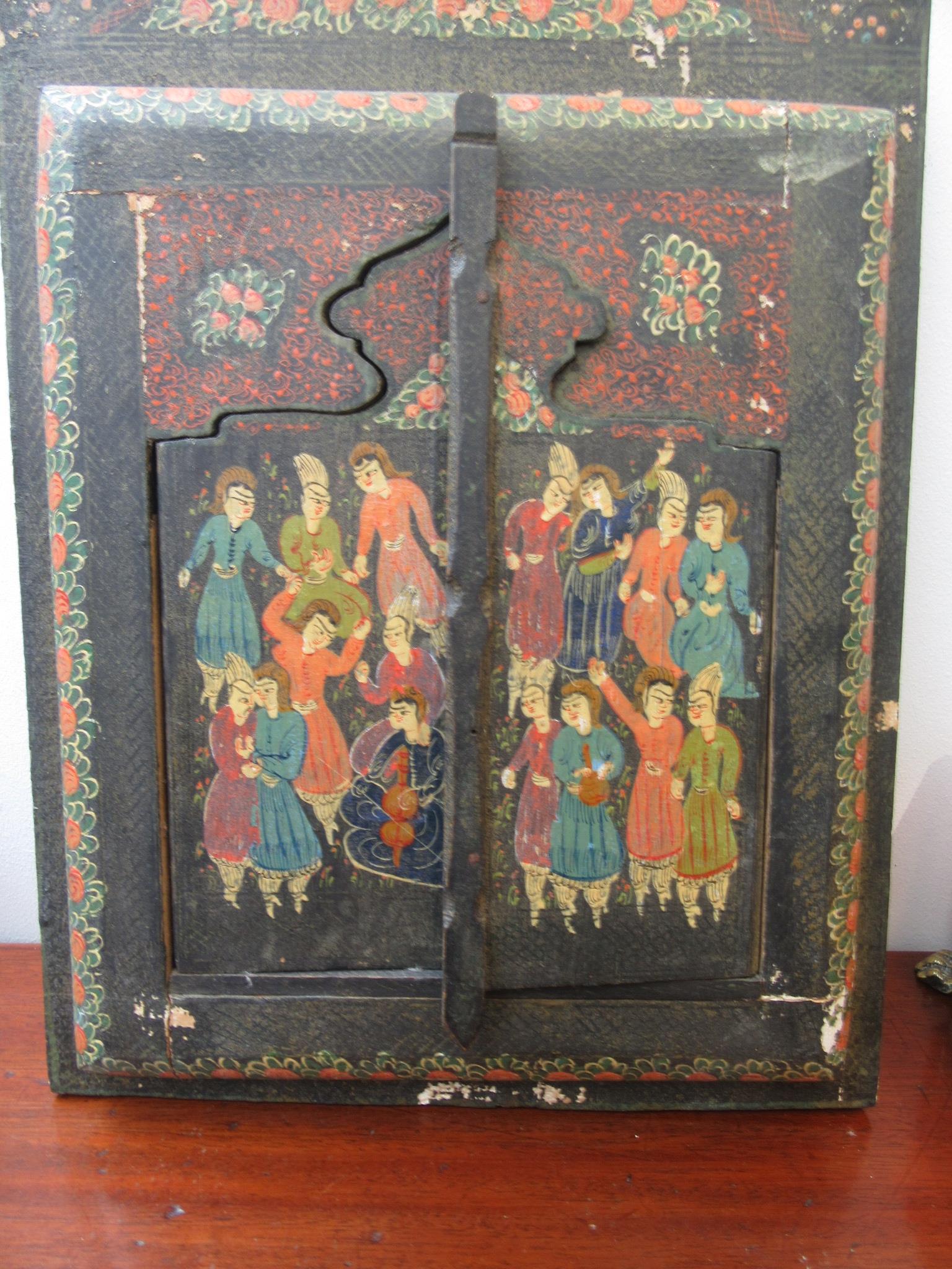 A Persian wall mirror, in a painted wood cabinet with a pair of doors decorated with figures, - Image 3 of 9