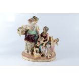 A continental Meissen style porcelain group. Condition report: Good condition.