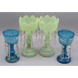 A pair of Victorian pale green glass lustres, height 22.5cm, diameter of top 10.