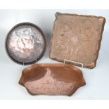 An Arts and Crafts Joseph Sankey copper tray, another copper tray,