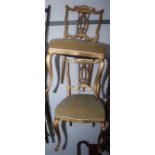 A pair of Edwardian gilt painted side chairs,