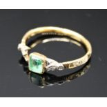 A George III enamelled gold emerald set ring inscribed 'Je Pense Toujours A Toi' the small emerald