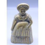 A Victorian brass and lead doorstop, in the form of a lady, height 14cm, width 8cm.