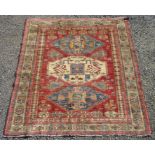 A Caucasian design rug,