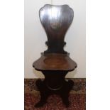 A George III mahogany hall chair, of sgabello form,