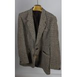 A hand woven Harris Tweed gentlemans coat for Dunn & Co,