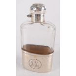 A hammered silver and cut glass spirit flask by Drew & Sons, Piccadilly Circus, London 1908,