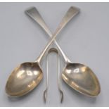 Two Georgian silver tablespoons, together with a pair of silver sugar tongs, 4oz.