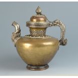 A Tibetan brass and silver coloured metal mounted teapot, 18th/19th century,