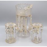 A Victorian clear cut glass lustre, height 30cm, diameter of top 15cm and a pair of small lustres,