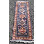 An Erivan runner, the blue field with five polychrome medallions,