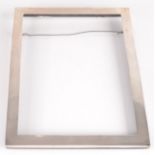 A plain silver mounted photograph frame.