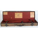 A Holland & Holland Ltd gun case, canvas covered with a central rectangular panel initialled C.E.
