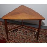A G-Plan teak triangular coffee table, circa 1970's, stamped EG to the underside, height 48.