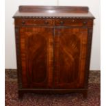 A fine and rare late 18th century mahogany side cabinet press with a pair of frieze drawers and