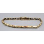 A 14ct gold Greek key pierced bracelet, 9.5g.