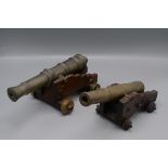 Two bronze model cannons, lengths of barrels 27cm and 25cm.
