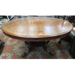 A Victorian walnut breakfast table,