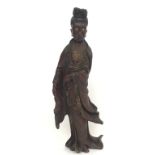 A Chinese standing carved wood figure of Quanyin, Goddess of Mercy, 19th century, height 115cm,