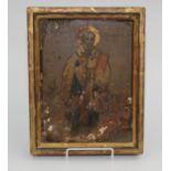 A painted wood icon, 19th century, inscribed G Hyios Niuojam, in a giltwood frame, 31.5 x 24.5cm.