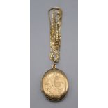 A 9ct gold locket on box-link 9ct gold chain, total weight 20g.