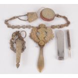 A brass chatelaine, a pipe smoker's knife and a silver toothpick.