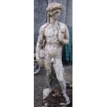 A large composition garden statue of a nude classical gentleman, on a square plinth base,