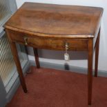 A walnut bow front side table, with a single drawer on square tapering supports, height 73cm,