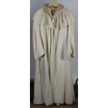 A long ladies cream cotton coat by T.B. & W. Cockayne Ltd. Sheffield, size 10/12, length 140cm.