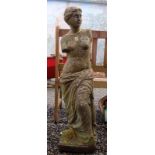 A composition garden statue of Venus,