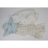 Seven white cotton and lace nightdresses, a pale blue cotton lady's top,