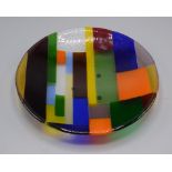 An Art glass shallow dish, with coloured geometric decoration, diameter 25.2cm.