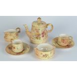A Royal Worcester blush ivory part tea service, with floral painted decoration,