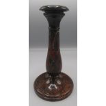A Cornish serpentine candlestick, with a baluster stem on a circular plinth base, height 22cm,