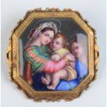 A good Victorian high purity gold mounted brooch set within an enamelled panel of the Madonna Della