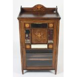 A late Victorian inlaid rosewood music cabinet,