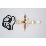 A Butler & Wilson jewelled cross pendant/brooch 14cm maximum.