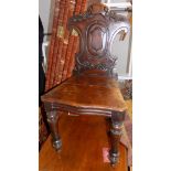 A mahogany hall chair, 19th century, height 85cm and two oak side chairs, 19th century,