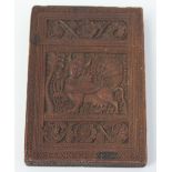 An Indian carved hardwood card case, height 11.6cm, width 8cm, depth 1.7cm.